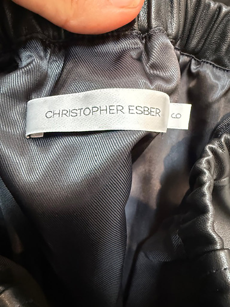 CHRISTOPHER ESBER