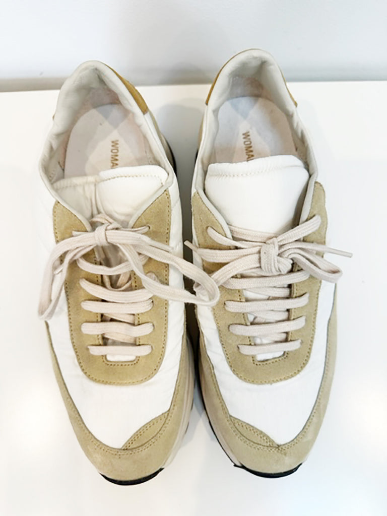 WOMAN BY COMMON PROJECTS